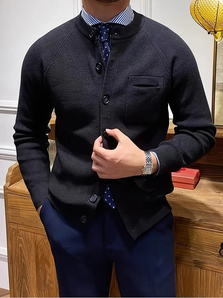 Close-up of men's ribbed knit cardigan. Long sleeve, crew neck, perfect fall/spring layering.