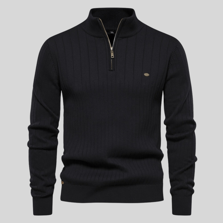 Man in a sophisticated ribbed mock neck half zip sweater, showcasing a modern, versatile men's fashion look.