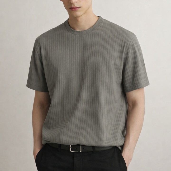 Close-up of a men's ribbed t-shirt, showcasing the sculpted fit and quality fabric for a sharp look.