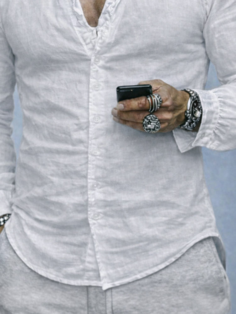 Modern men's fashion: a slim fit long sleeve casual shirt with a unique ruffled neck, ideal for a smart look.