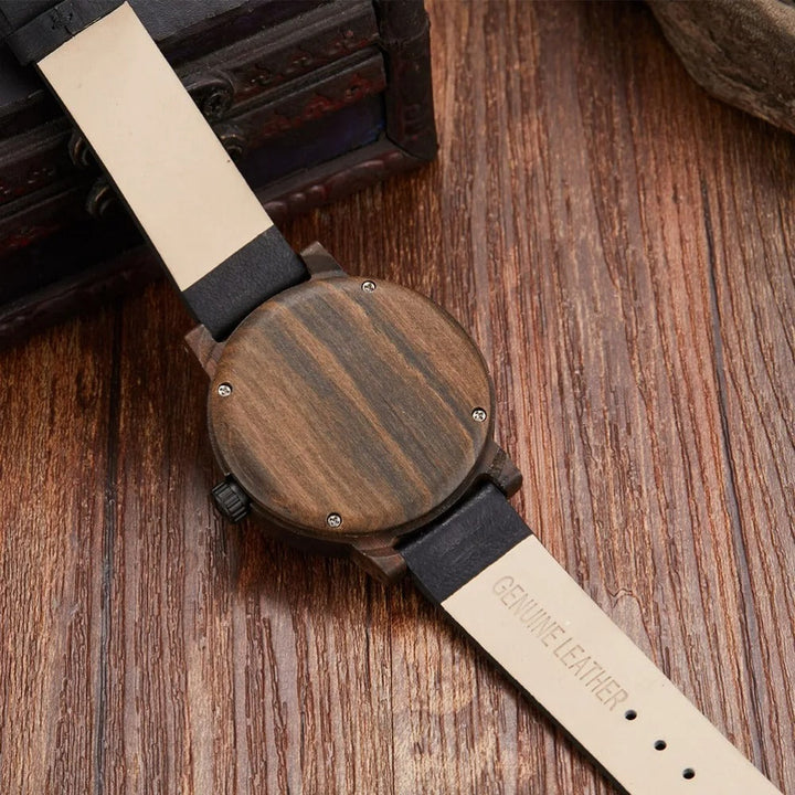 Distinctive men's timepiece: wood and leather watch with a rugged aesthetic and functional compass detail.