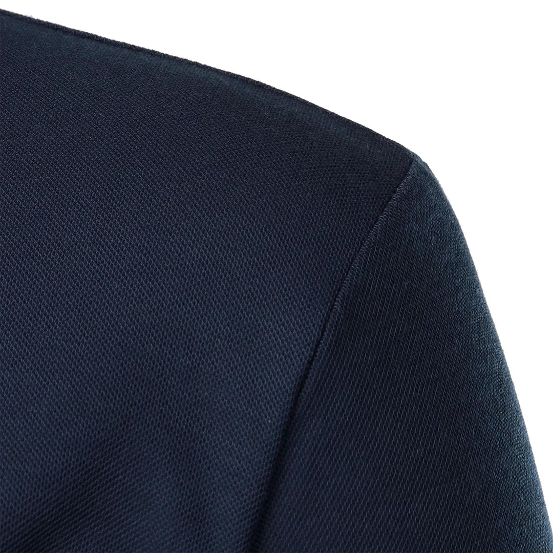 Black men's short sleeve polo, collared, with a convenient chest pocket, offering versatile style.
