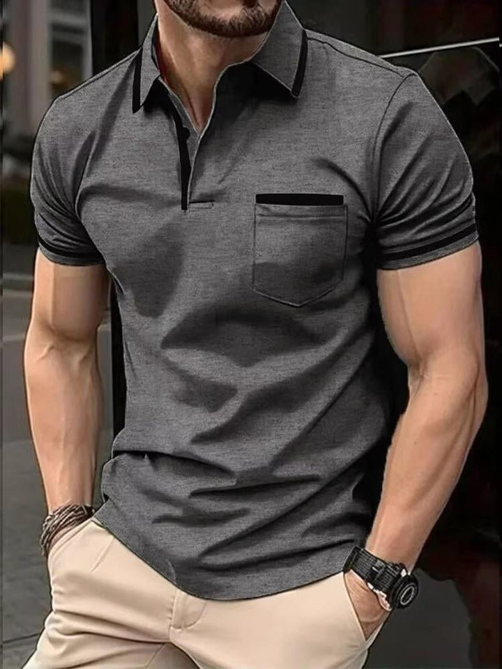Versatile men's collared polo shirt, short sleeve, with a chest pocket. Ideal for casual & work wear.