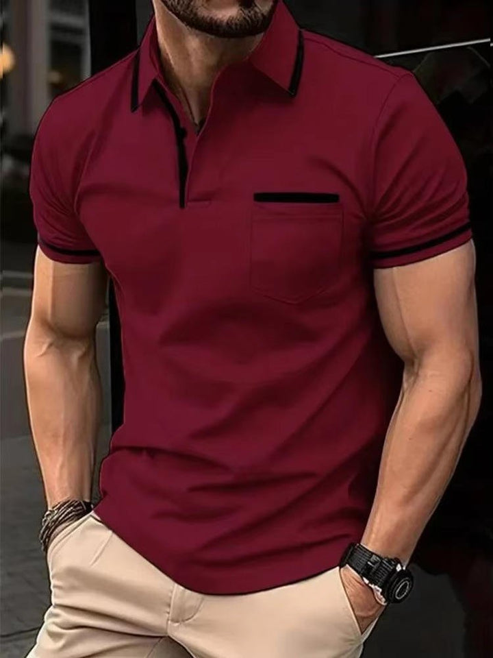 Navy blue men's short sleeve polo shirt with chest pocket, classic fit, for versatile style.