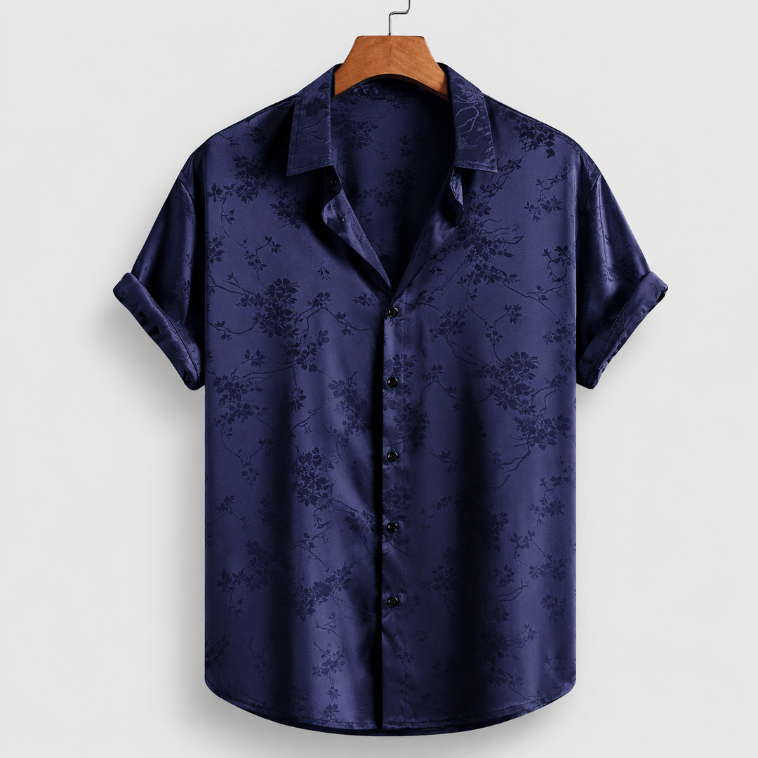 Men's short sleeve polo shirt with elegant floral satin print. Perfect stylish casual top for summer.