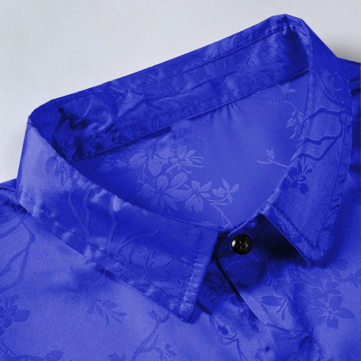 Men's short sleeve polo in a luxurious floral satin print. Regular fit, perfect for stylish summer casual wear.