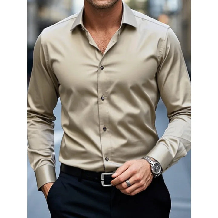 Versatile men's slim fit button-down shirt, ideal for smart casual style. Long sleeve collared top.