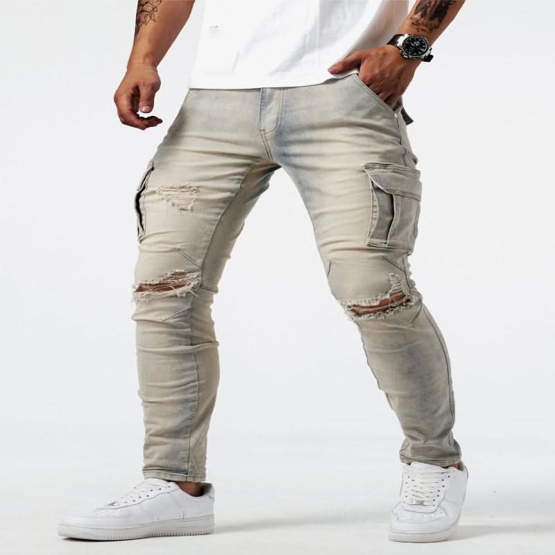 Neatly folded men's blue denim slim fit cargo jeans with visible utility pockets, ready for versatile styling.