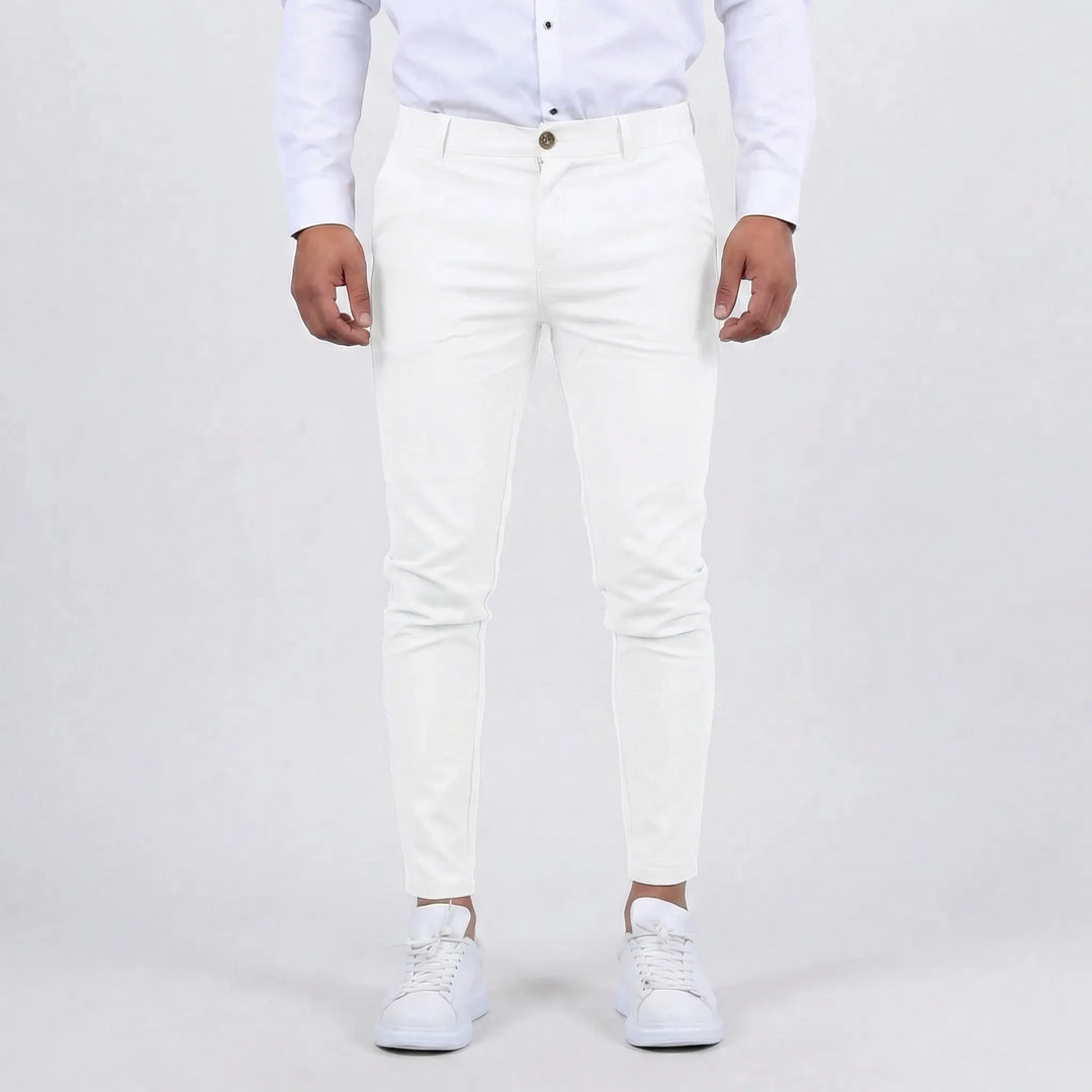 Men's slim fit chino pants styled with a polo shirt, showcasing a relaxed yet stylish everyday outfit.