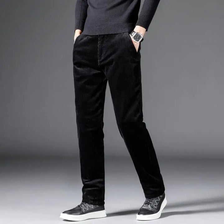 Man wearing comfortable slim fit pants, demonstrating ease of movement and stylish everyday casual appeal.