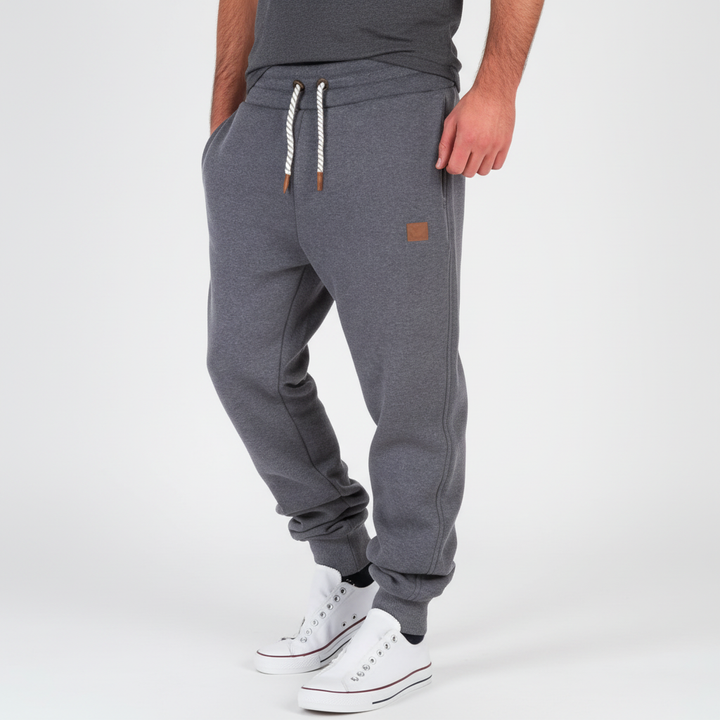 Lance men's slim-fit joggers, offering a sleek athletic look for leisure, gym, or comfortable daily wear.