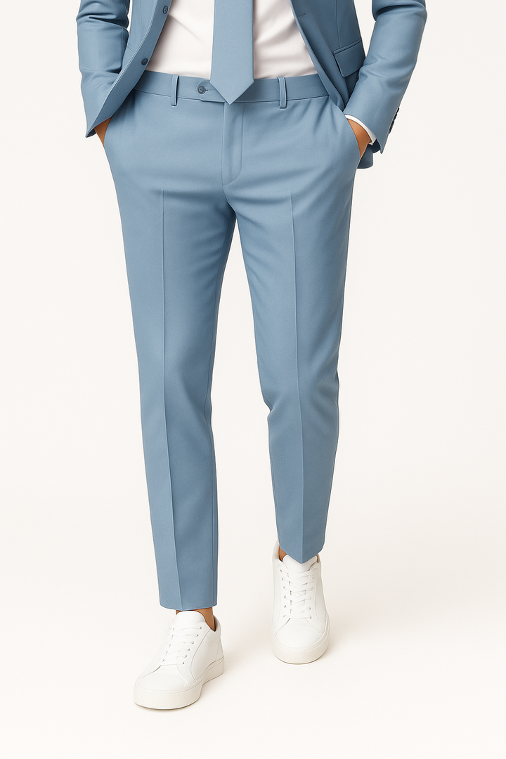 Stylish men's tailored light blue slim fit summer suit. Lightweight two-piece for modern formal and wedding attire.