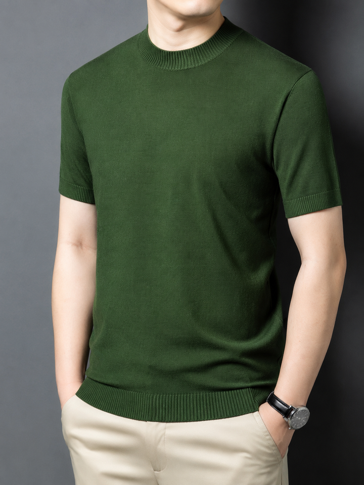 Close-up of the soft fabric on a men's slim fit mock neck tee, short sleeve, comfort fit.