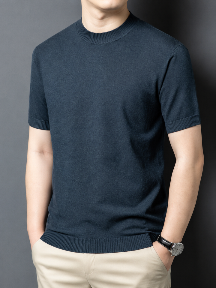 Men's slim fit short sleeve mock neck t-shirt, styled with casual spring fashion. Versatile top.