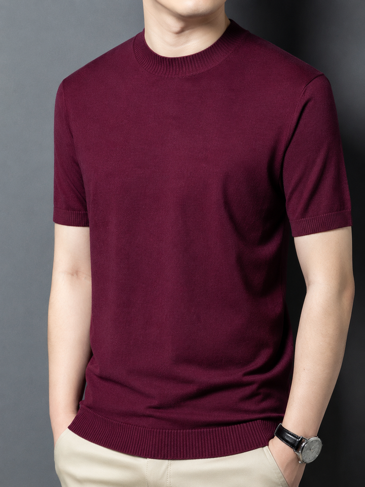 Man enjoying a casual day in a slim fit mock neck short sleeve t-shirt. Everyday comfort.