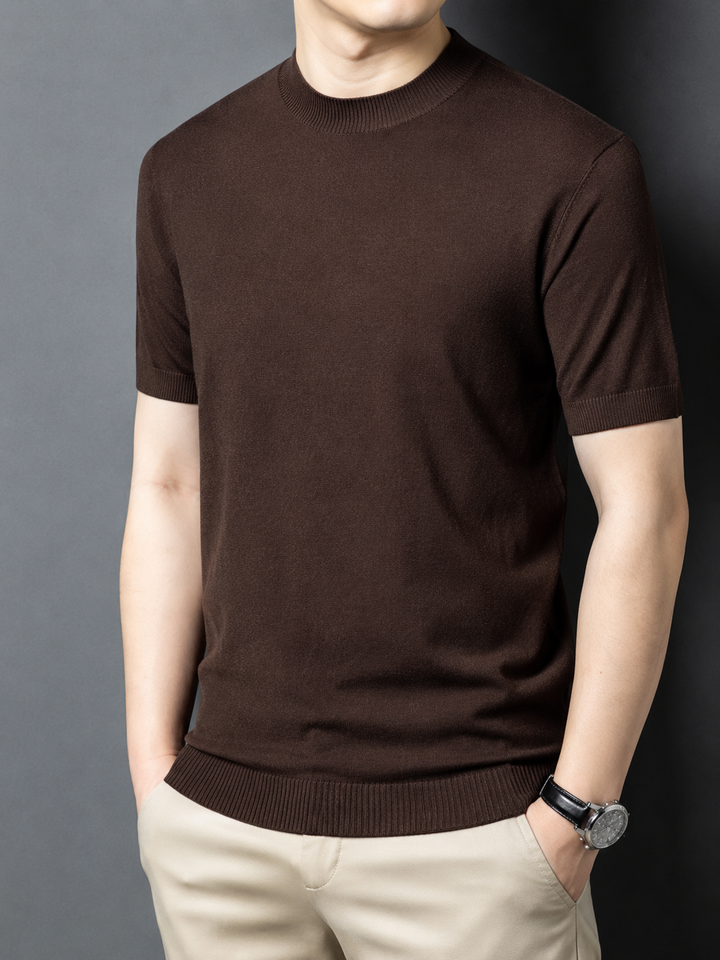Side view of a casual men's slim fit mock neck t-shirt, short sleeve, modern spring fashion.