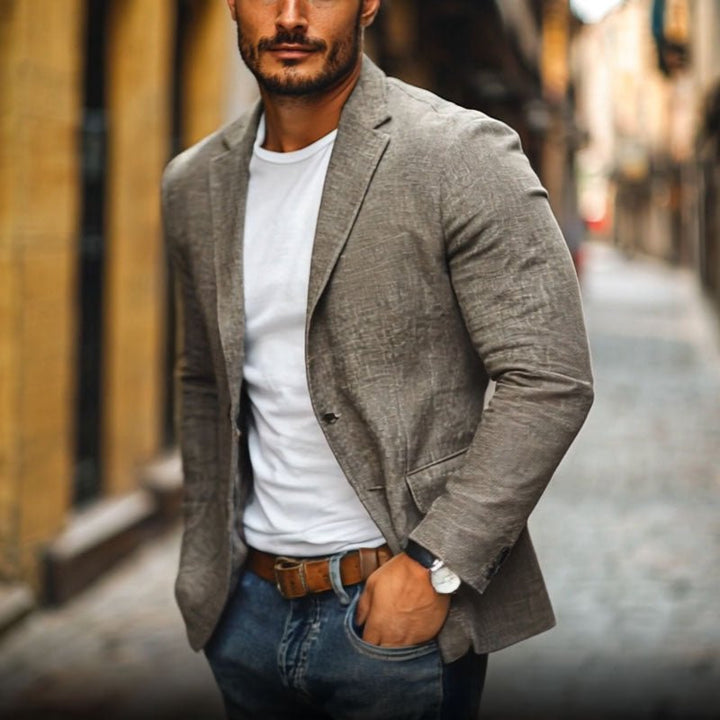 Stylish men's slim fit single-breasted blazer for modern fashion. Great for smart casual, business wear & summer events.