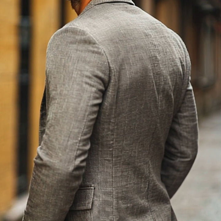Elegant men's single-breasted slim fit blazer. Perfect versatile jacket for business casual, summer style, or wedding attire.