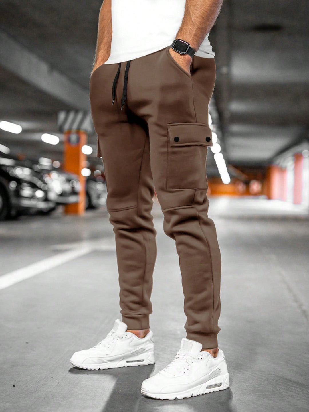 Athletic men's slim-fit joggers, flexible and comfortable for active streetwear style.
