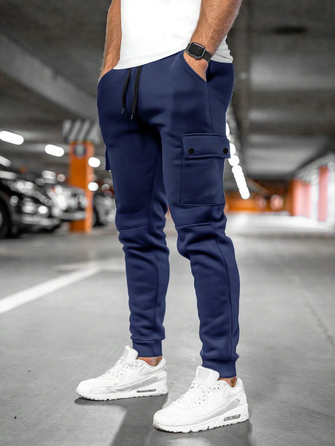Detailed men's slim-fit streetwear joggers, ideal for casual and fashion-forward looks.