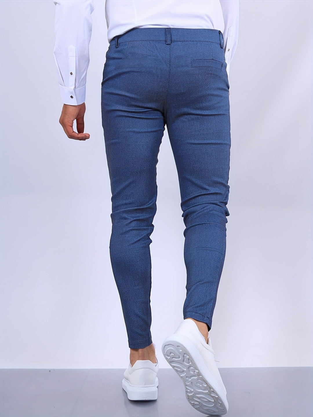 Tapered leg men's stretch chinos in a sleek slim fit, perfect for contemporary style.