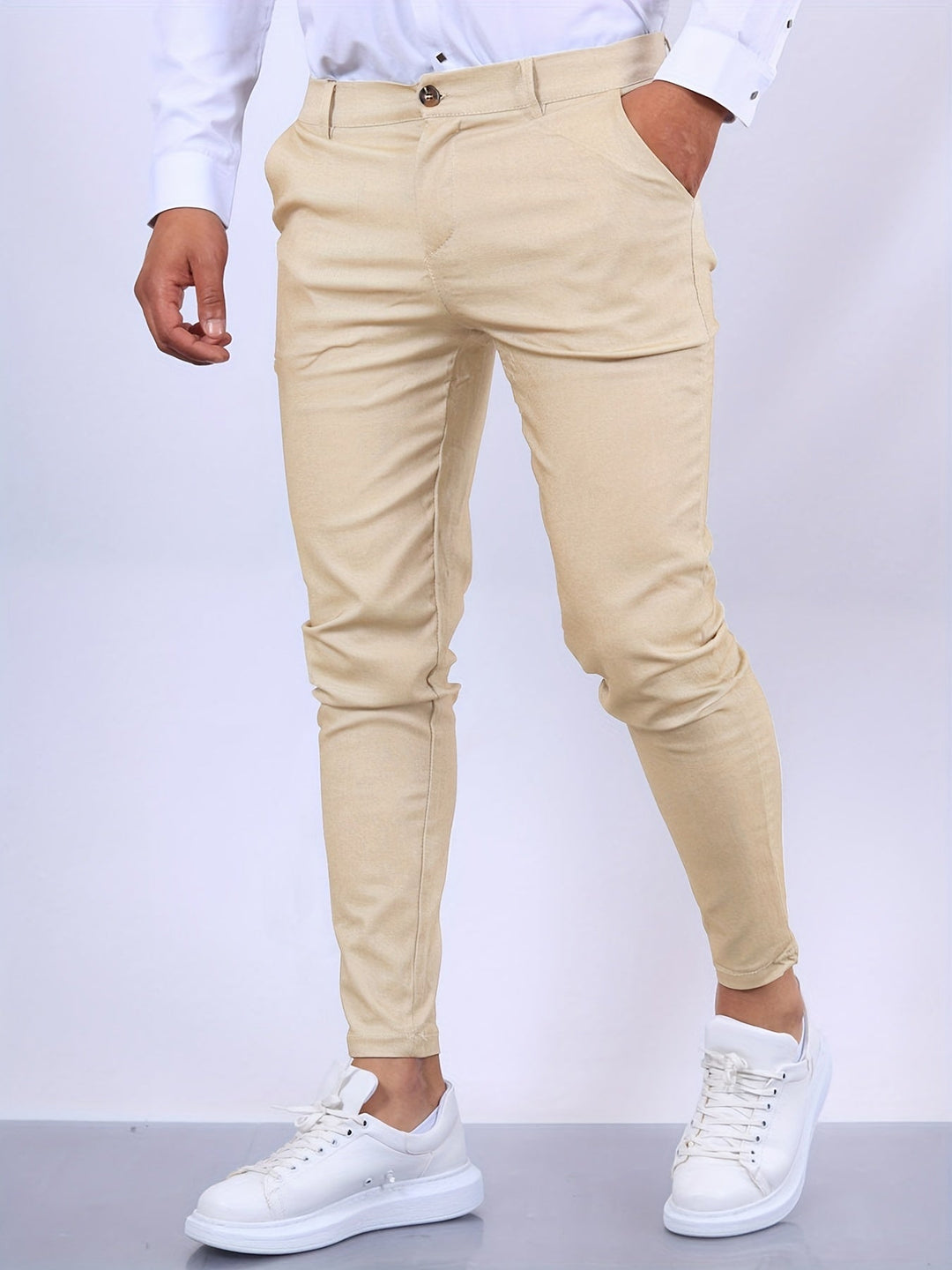 Fashionable men's tapered leg stretch chino trousers, designed for a modern aesthetic.