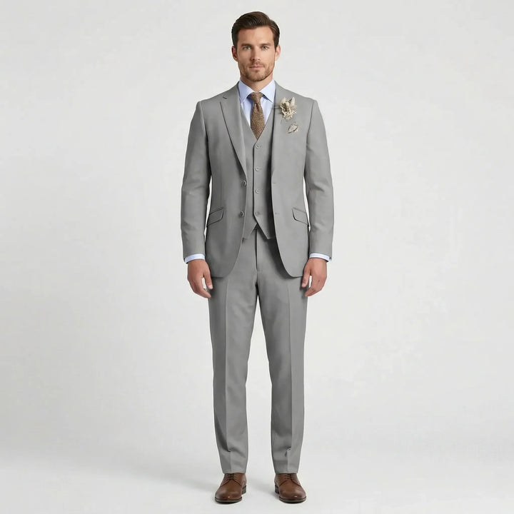 Tailored men's slim-fit three-piece suit for a sharp, modern look; perfect for formal events & weddings.
