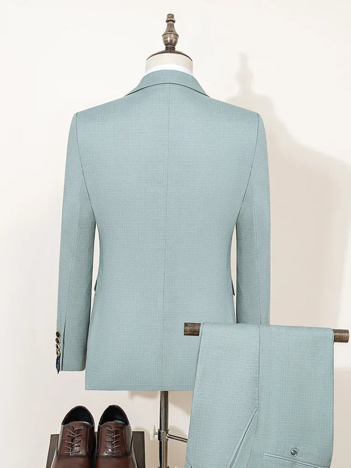 Elegant men's slim fit three-piece wedding suit, tailored for a sharp look on your special day.