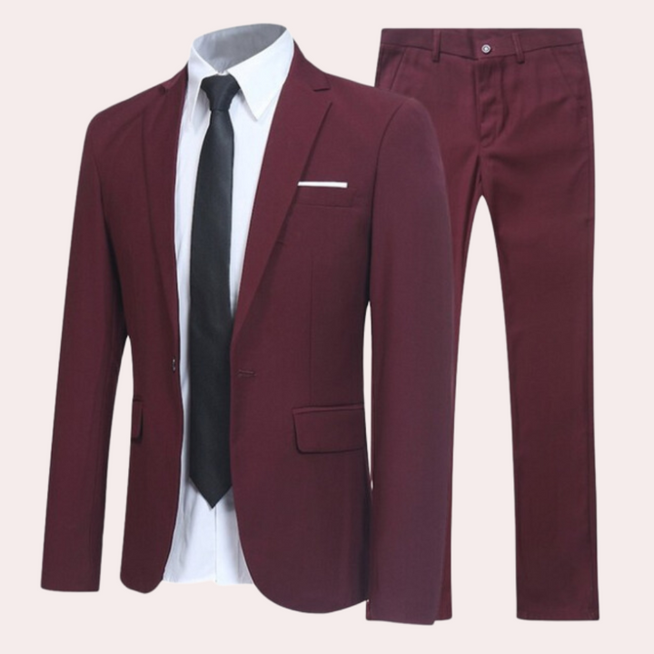 Sleek men's slim fit two-piece formal suit. Durable, all-season business or party wear with a modern blazer & trousers.