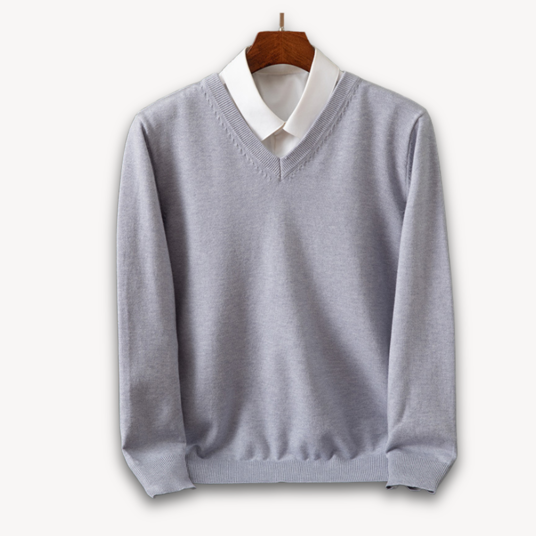 Versatile men's slim fit V-neck sweater, ideal for layering over shirts for a smart business casual look.