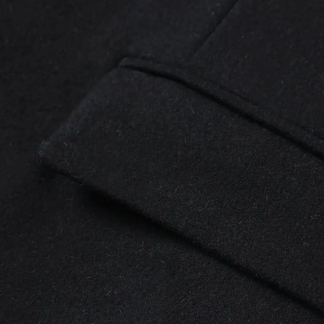 Stylish men's slim fit winter coat. Warm trench coat with a stand collar, perfect for cold weather fashion.
