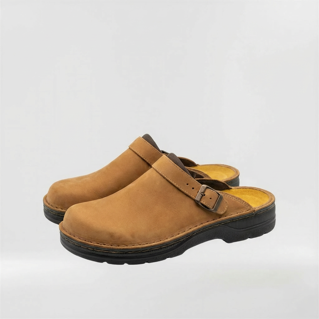 Black men's everyday slip-on clogs. Closed-toe, practical comfort footwear for indoor & outdoor activities.