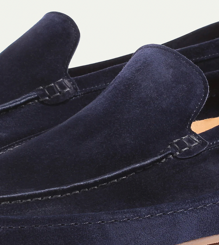 Premium men's slip-on loafers. Cushioned comfort, elegant casual footwear for spring/summer fashion.