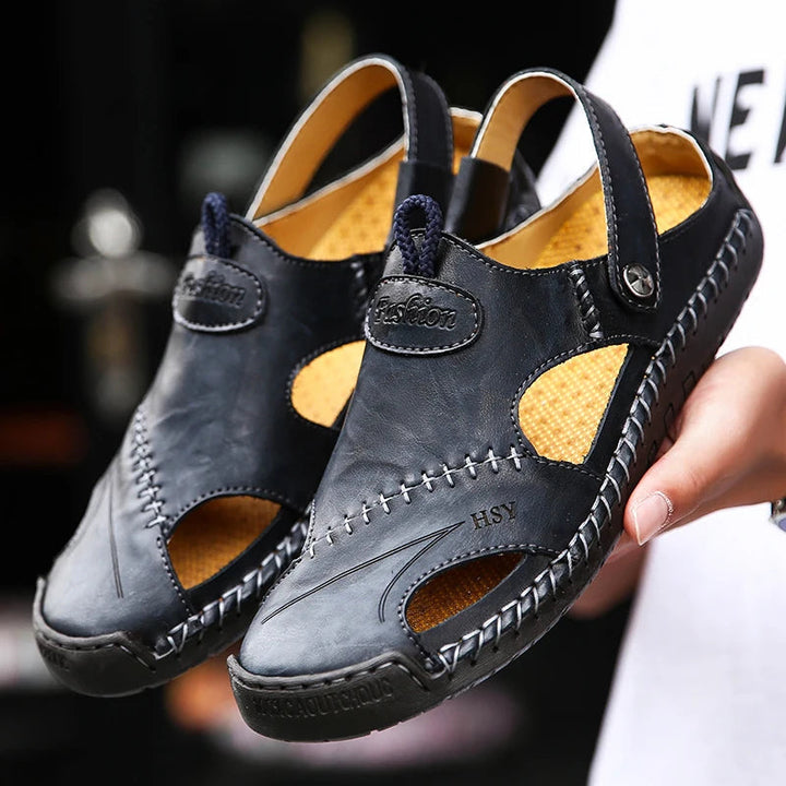 Adjustable strap men's slip-on sandals, closed-toe, comfortable for outdoor use.