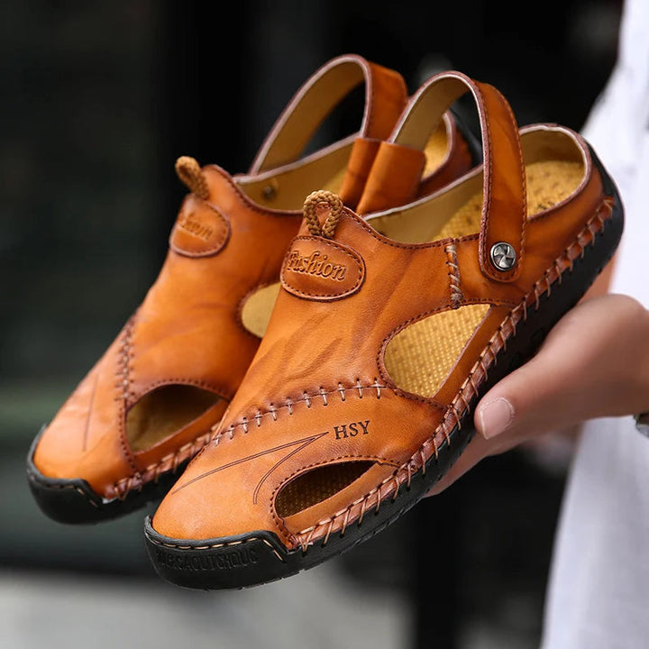 Men's breathable closed-toe slip-on sandals with arch support for daily comfort.
