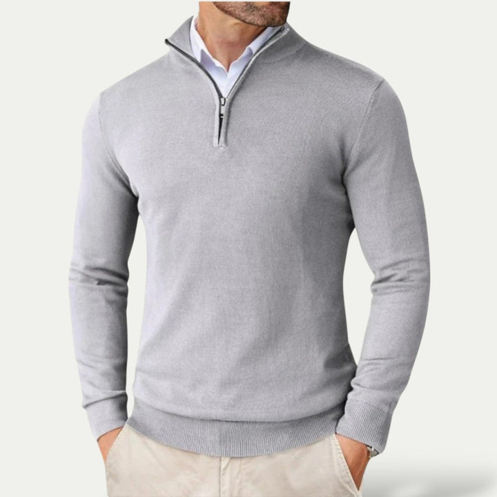 Fashionable men's half-zip long-sleeve pullover, an essential smart casual layering piece.