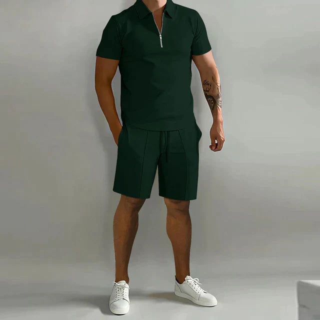 Casual men's summer outfit featuring a modern polo shirt and matching relaxed shorts. Ideal for warm weather.