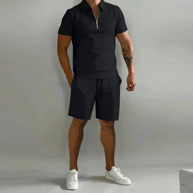 Smart men's summer fashion: a stylish short-sleeve polo paired with comfortable drawstring shorts.