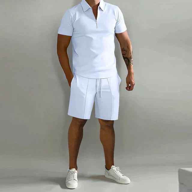 Trendy men's summer casual wear: a breathable polo and fashionable shorts, perfect for warm weather.