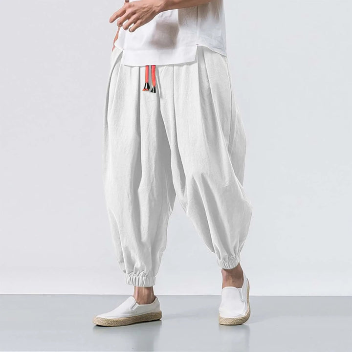 Men's versatile Harem Jogger Pants, baggy & comfortable for athletic, casual, or lounge wear.