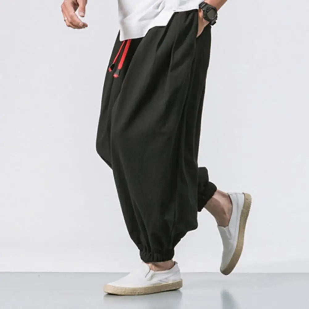 Men's athletic Harem Jogger Pants, loose fit for yoga, gym, or casual activities. Drawstring waist.