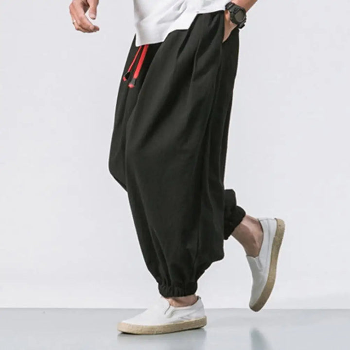 Men's athletic Harem Jogger Pants, loose fit for yoga, gym, or casual activities. Drawstring waist.