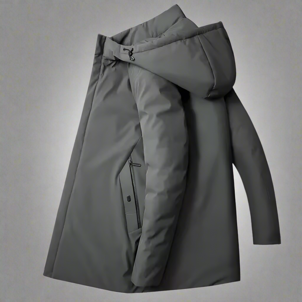 Full body shot of a man in a gray insulated hooded winter coat, perfect for cold weather fashion.