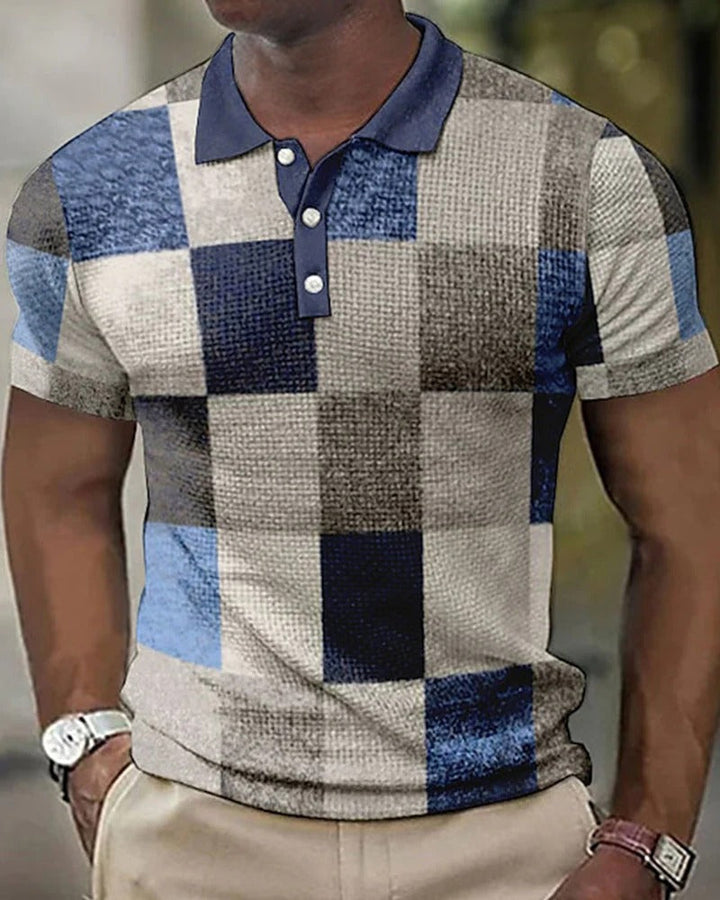 Versatile men's short-sleeve polo with a modern check grid pattern. Breathable fabric, ideal for casual style.