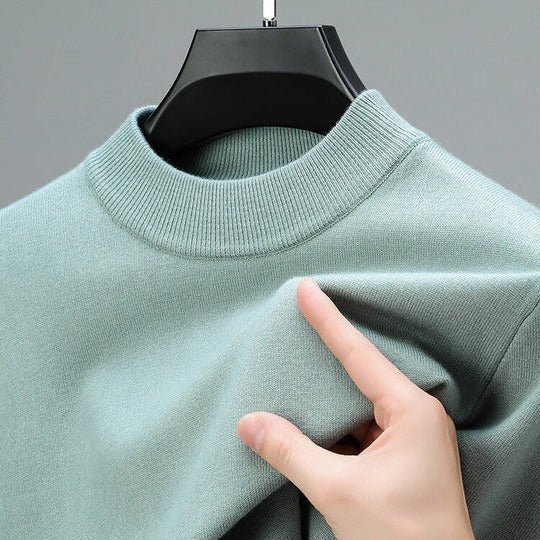 Versatile men's mock neck pullover sweater, essential for fall style and modern men's fashion.