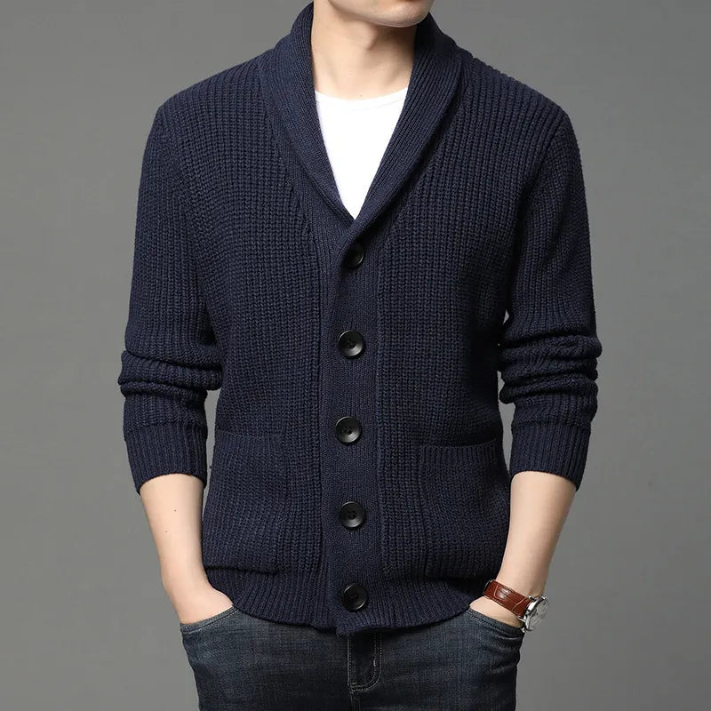 Fashionable men's ribbed knit cardigan featuring a distinctive shawl collar, suitable for layering and casual style.