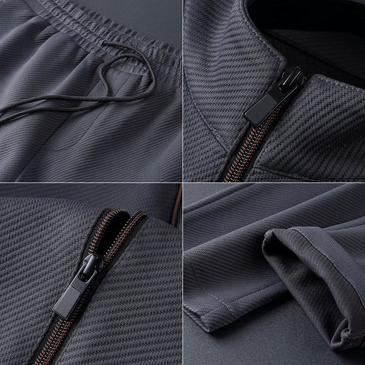 Man models a trendy men's jogger set with zip-up jacket & tapered pants, ideal for active lifestyle.