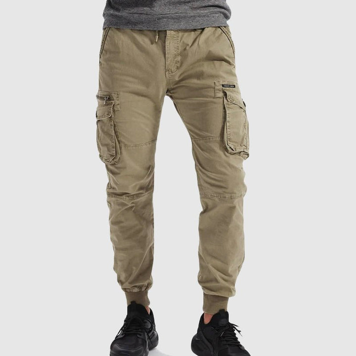 Stylish men's cargo jogger pants in olive green, perfect for streetwear, outdoor activities & all-season fashion.