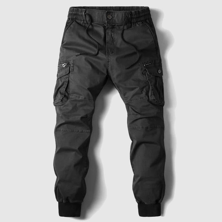 Versatile men's jogger pants, a blend of tactical and cargo style, suitable for all-season wear & active outdoor pursuits.