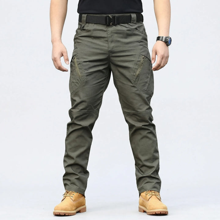 Durable men's tactical cargo pants, quick-dry & weather resistant, ideal for hiking, work & outdoor wear.